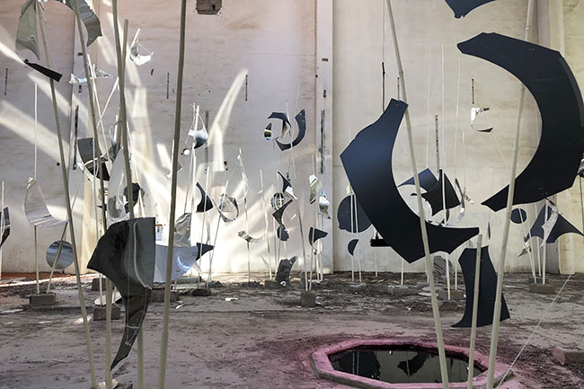 Nikolaus Gansterer, Sympoiesis Obersatory, 2019, site specific installation with found materials, mirrors, bamboo, wood, wire, sound, video, 14th Sharjah Biennial, Ice Factory, Kalba, UAE